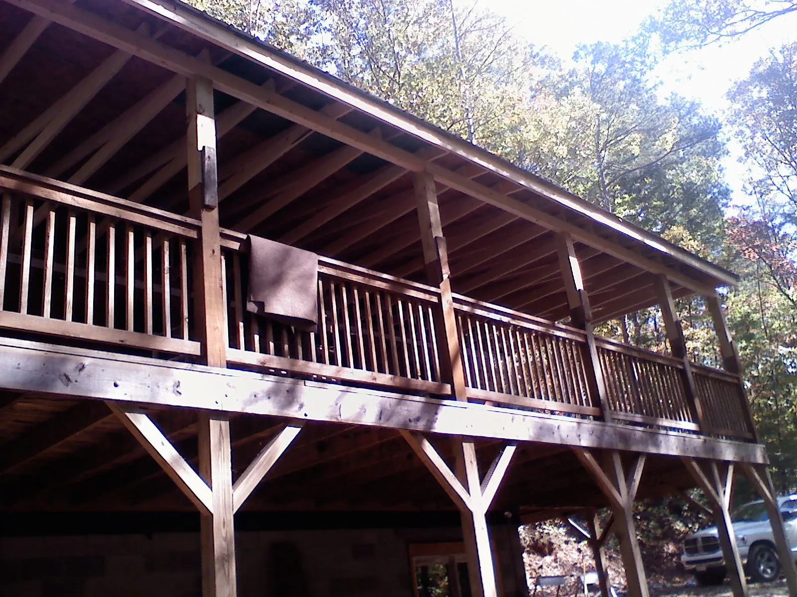 Timber framing under a new elevated porch and deck — Roof Leak Repair in Kerrville by Roofing Brothers